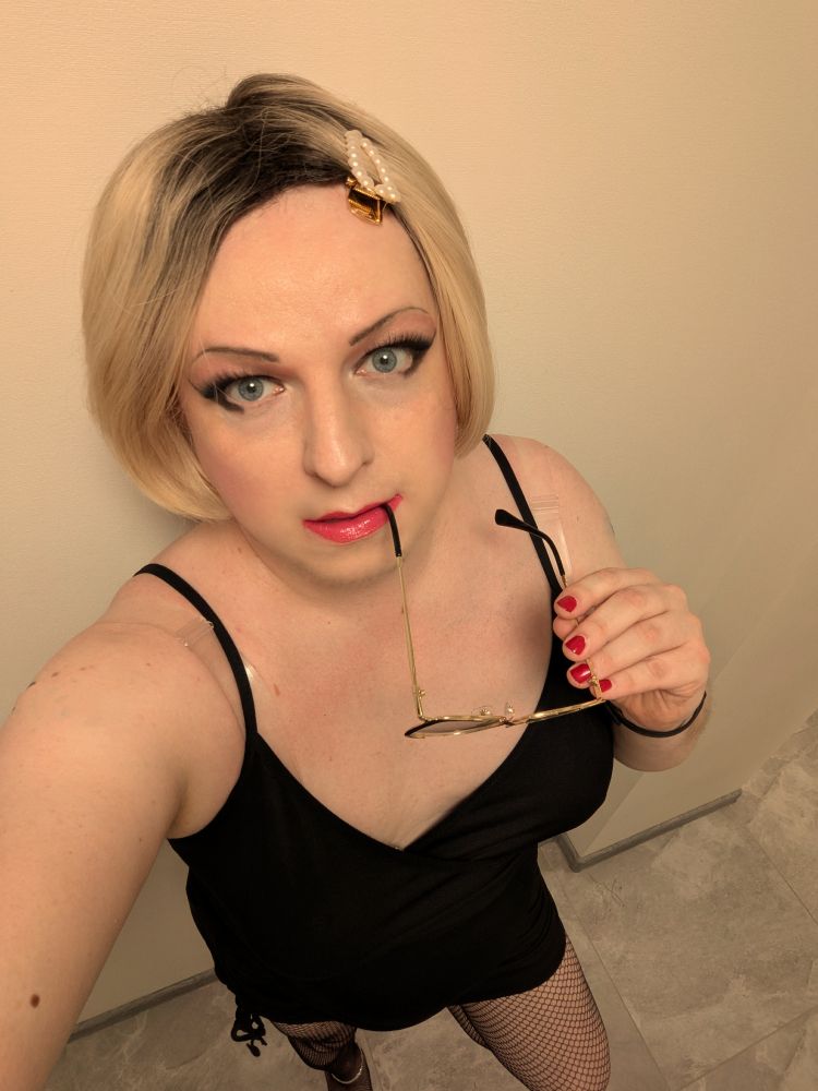 Sissy slut Masha is biting her glasses in guesses.