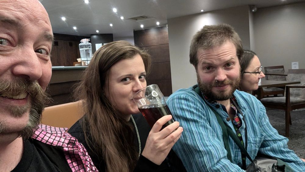 GigerPunk grinning as Emily tries a Dark Side of the Moon Pie, then followed by Tej