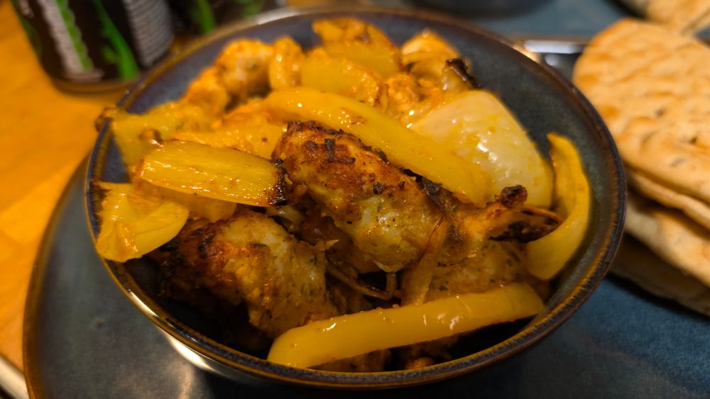 Free range chicken shawarma with peppers and onions 