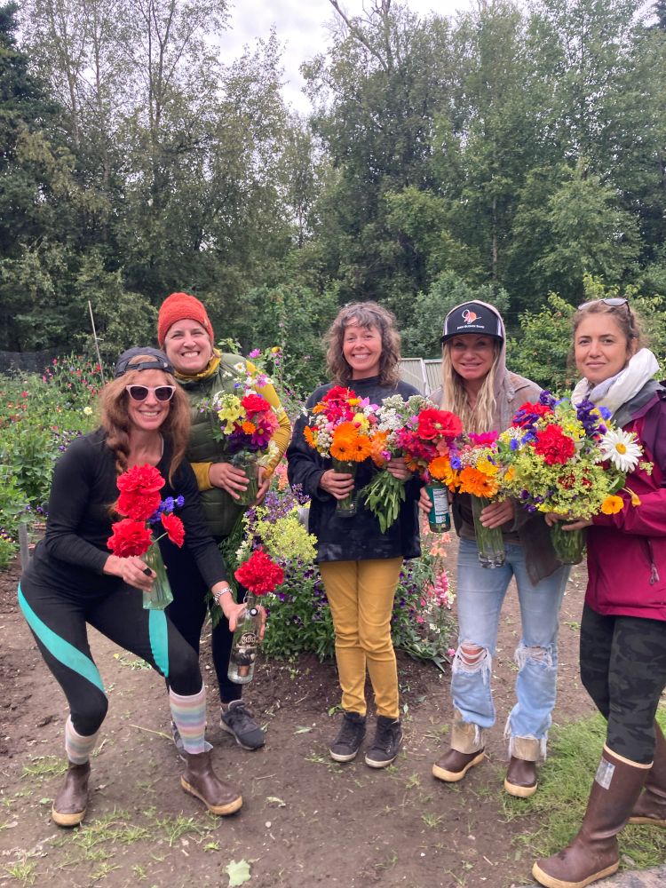 Raspberry pickers go home with bouquets.