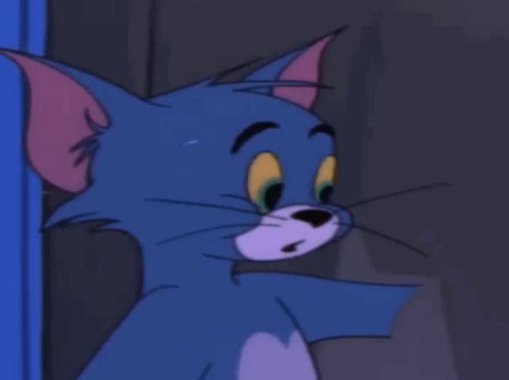 a close up of a cartoon cat with a serious look on his face