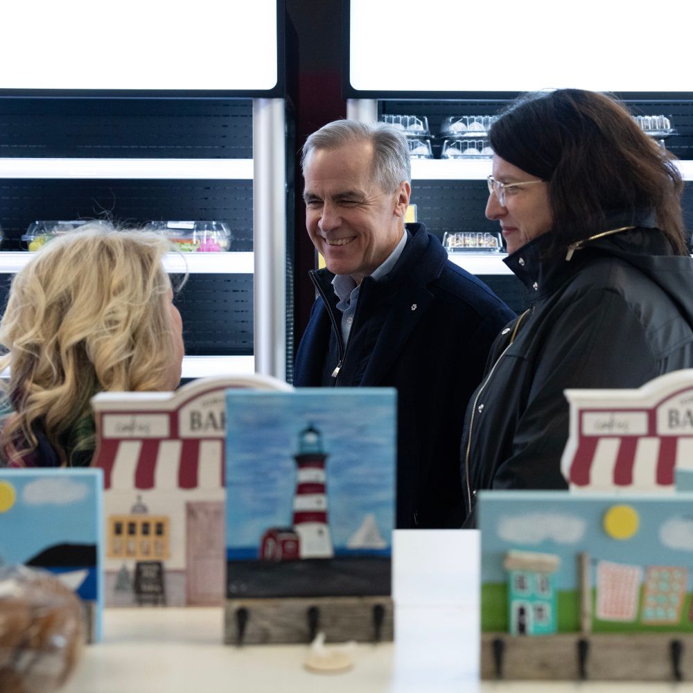 Prime Minister Mark Carney greets people at Rosie’s Restaurant & Bakery in Gander, NL. 