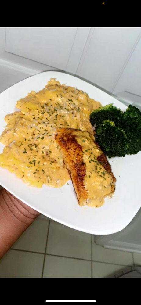seafood stuffed ravioli w/roasted salmon in a cajun cream sauce. 