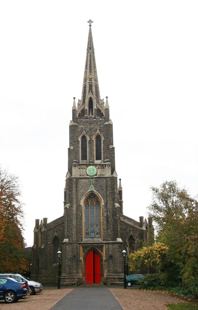 
View of the church with its tall spire (as mentioned by Dickens) and red west door
