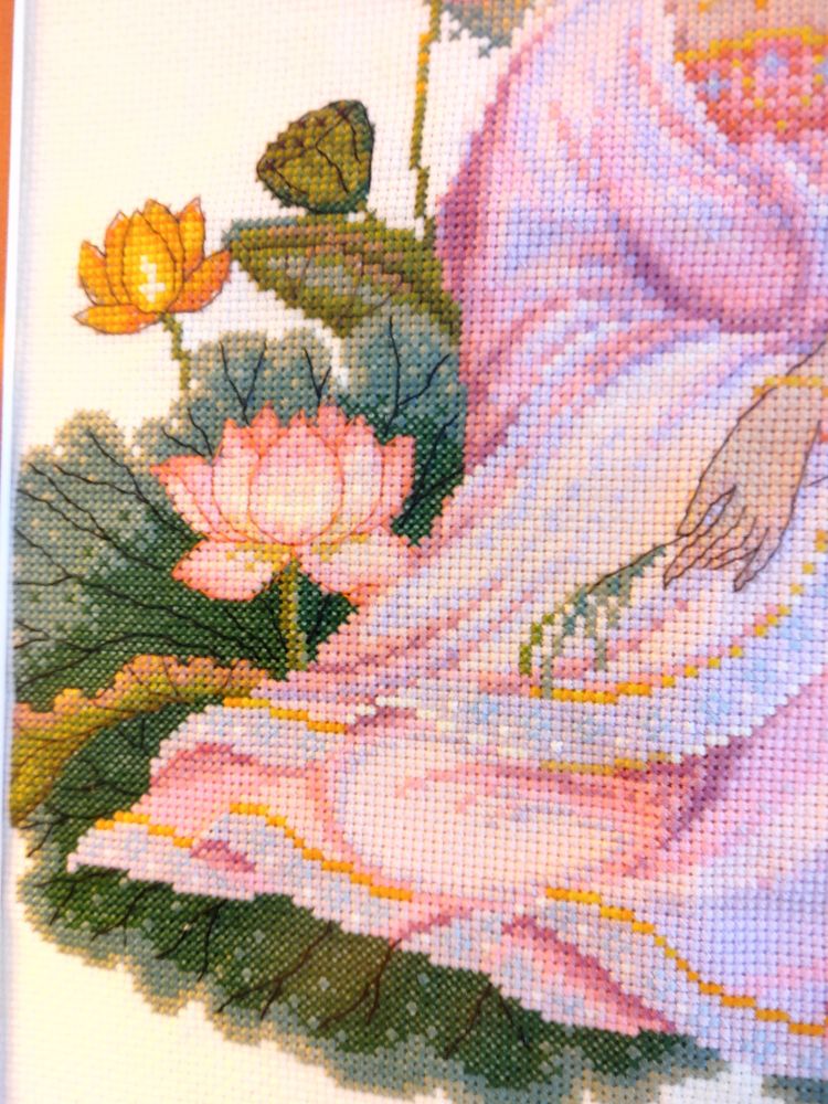 Close up view of crossstitch Quan Yin 