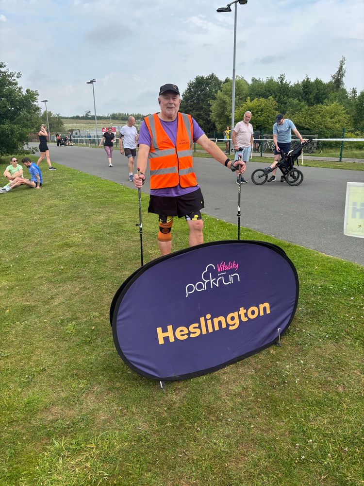 Me behind the pop up wearing the tailwalker vest with my Nordic walking poles