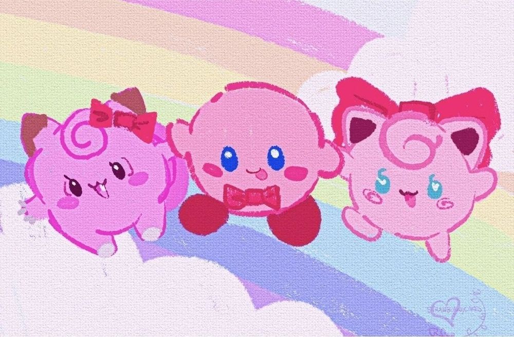 A stylized illustration of the Pokemon Clefairy, Kirby, and the Pokemon Jigglypuff holding hands and dancing on a rainbow. Clefairy wears a small bow on her head, Kirby wears a bow on his chest, and Jigglypuff wears a big bow in the back of her head. Clefairy is a pink Pokemon with two horns with brown tips. She has curly hair on her forehead and a curly tail. Kirby is a round, pink character with blue eyes and pink blush, and big red shoes. Jigglypuff is a round, pink, Pokemon with blue eyes and curly hair on her forehead, with two big ears.