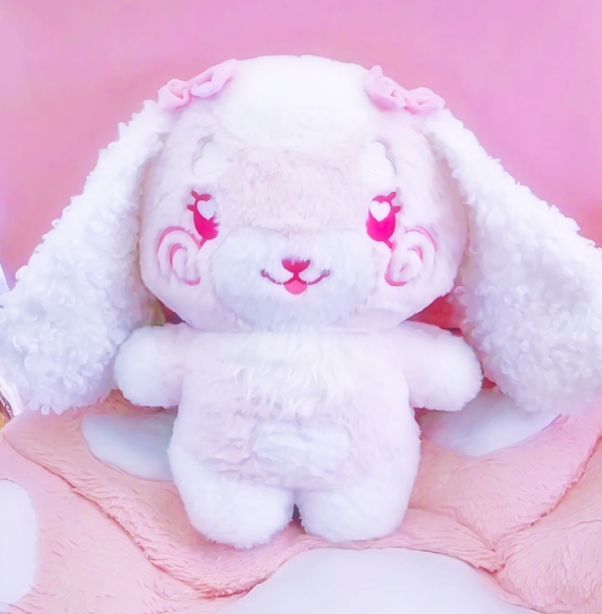 A pink and white lop bunny plush