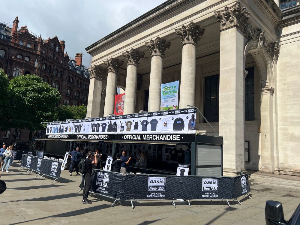 Oasis merch stall outside Manchester Central Library 
