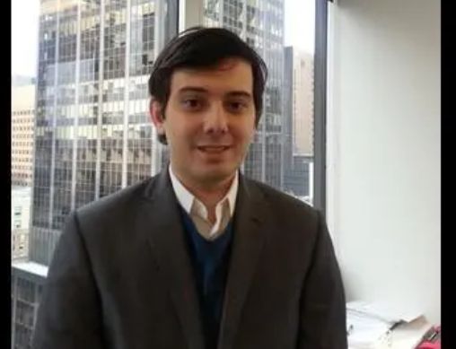 Wiki: 

Martin Shkreli (/ˈʃkrɛli/; born March 17, 1983) is an American investor and businessman. Shkreli is the co-founder of the hedge funds Elea Capital, MSMB Capital Management, and MSMB Healthcare, the co-founder and former CEO of pharmaceutical firms Retrophin and Turing Pharmaceuticals, and the former CEO of start-up software company Gödel Systems, which he founded in August 2016.

In September 2015, Shkreli was widely criticized when Turing obtained the manufacturing license for the antiparasitic drug Daraprim and raised its price to insurance companies from $13.50 to $750.00 (USD) per pill.

In 2017, Shkreli was convicted in federal court on two counts of securities fraud and one count of conspiracy. He was sentenced to seven years in prison and up to $7.4 million in fines. In the civil antitrust case, Shkreli was fined a further $64.6 million to be repaid to victims. In May 2022, he was released early from the low-security federal prison in Allenwood, Pennsylvania. He is permanently banned from serving as an officer of any publicly traded company.
