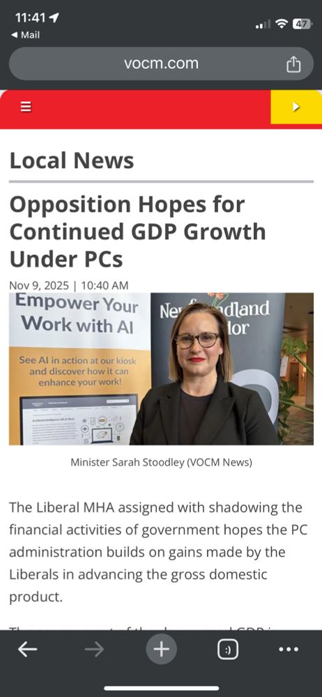 Screenshot of a November 9, 2025 VOCM article titled “Opposition Hopes for Comtinued GDP Growth Under PCs”. There is an older photo of Liberal MHA Sarah Stoodley, who was the Minister of Government Modernization and Service Delivery, and Minister Responsible for the Office of the Chief Information Officer at the time of the photo. In the background of the photo is a printed display banner that says “Empower Your Work with AI” at the top, followed by the text “See AI in action at our kiosk and discover how it can enhance your work!”
