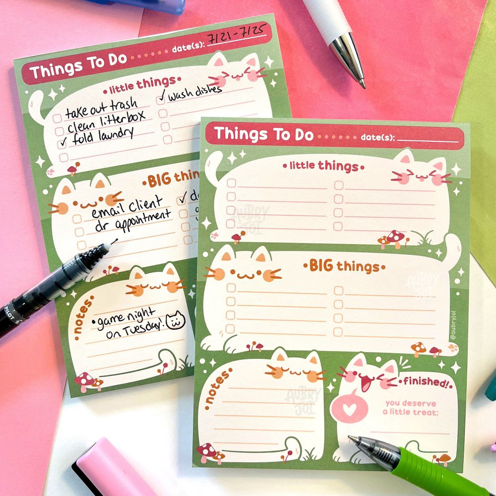 A notepad design featuring cute, stylized chubby cats, each with a list designed into them. The top of the pad reads “Things To Do” and the cat lists read “little things,” “big things,” “notes,” and “finished! You deserve a little treat.”