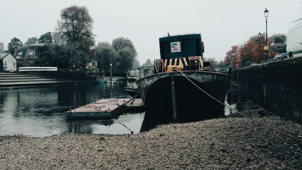 River Thames at very low tide as part of the annual draw off at Eel Pie Island, Twickenham 
