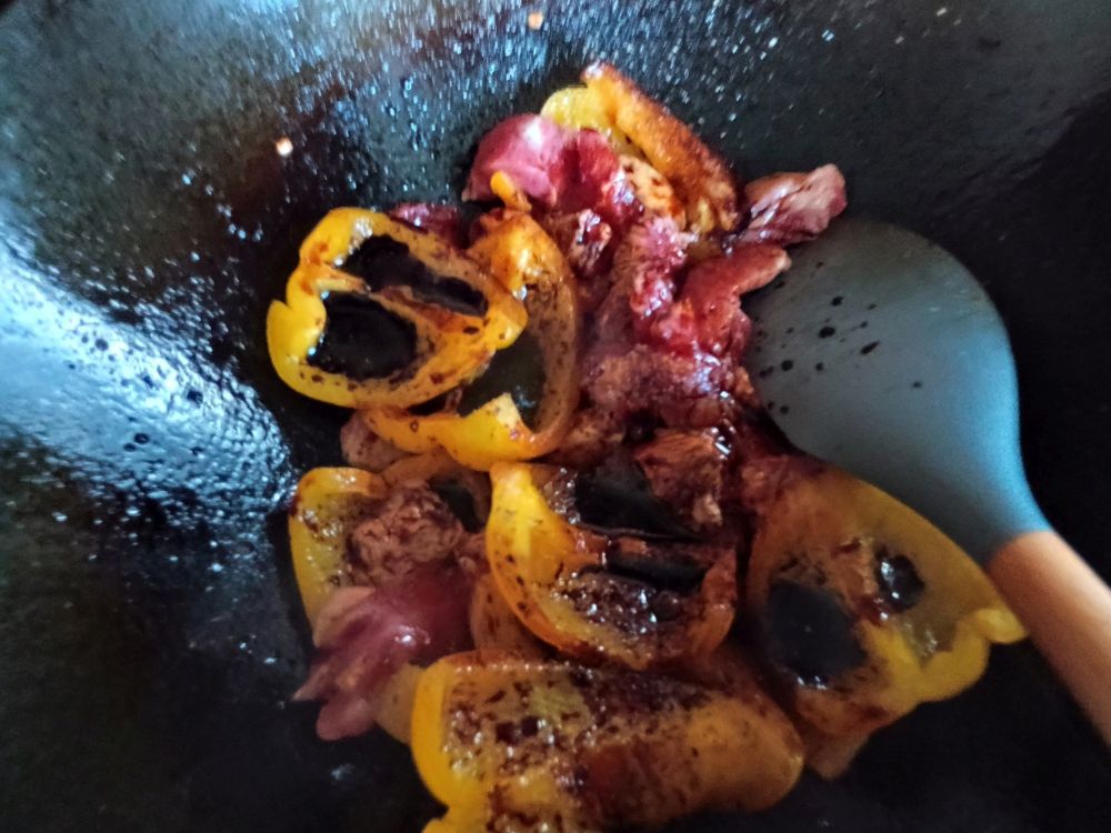 Add dark soy, cook for a bit.