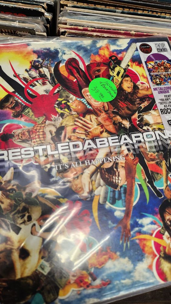 The album It's All Happening by Iwrestledabearonce