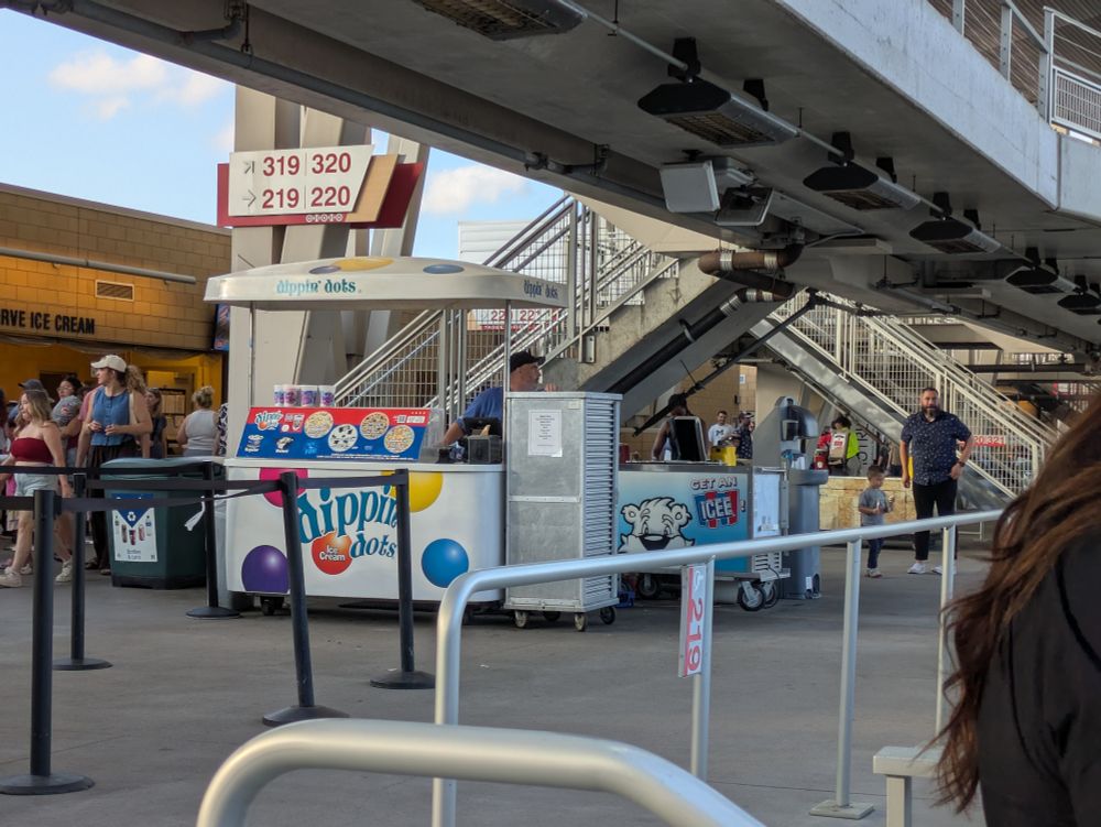 There is nobody in line at the Dippin' Dots stand in the second deck at Target Field.