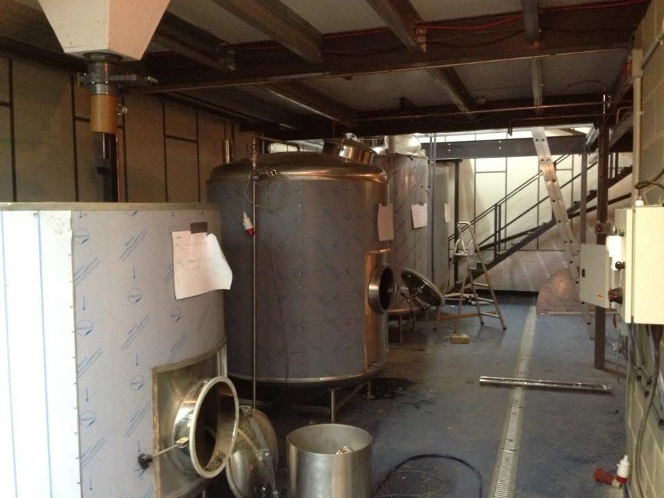 Brewery in construction, tanks wrapped in protective film