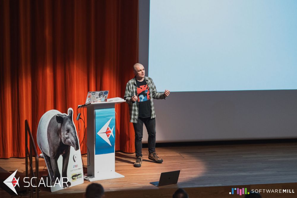 Michał Płachta giving a talk at Scalar 2025