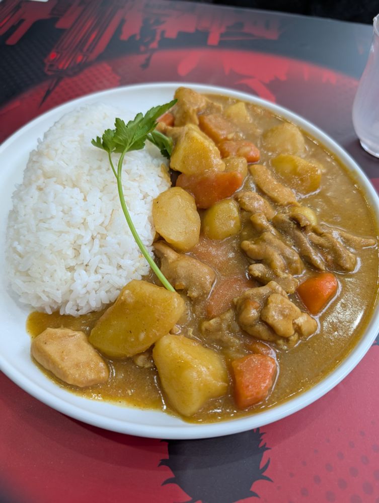 A plate of Japanese curry and rice. There are potatoes, which is a bit unusual for Japanese curry in my experience.