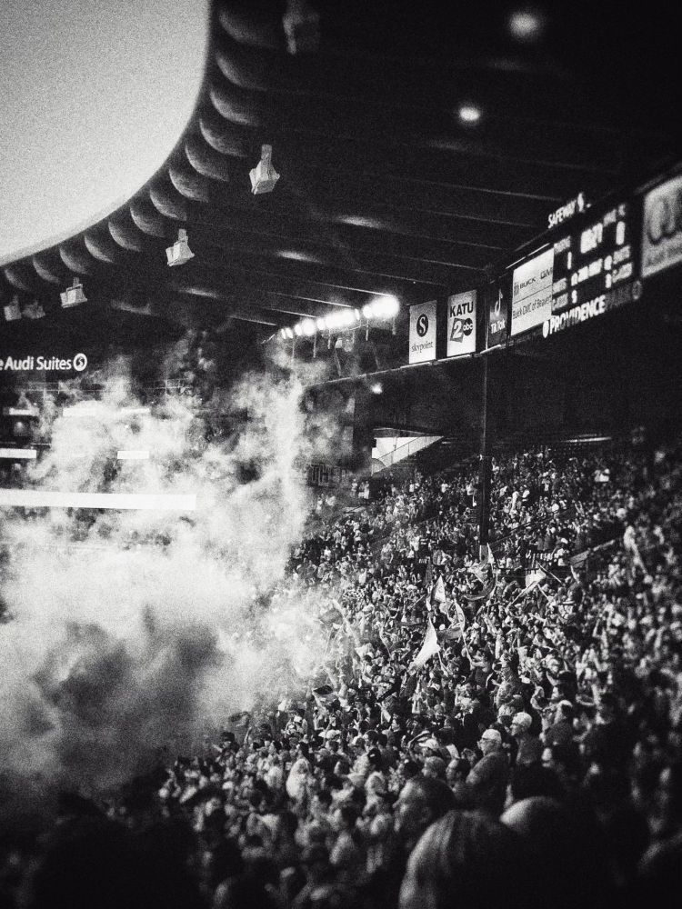 Smoke flows into the North End of providence park after the Timbers score a goal. 