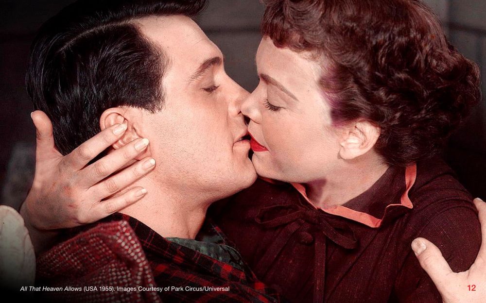 An imagine of two people embracing in a kiss. 
