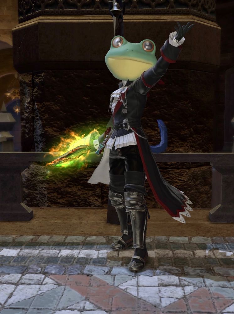 Ayita wearing his caster glam. He’s glammed the headpiece into the frog headpiece