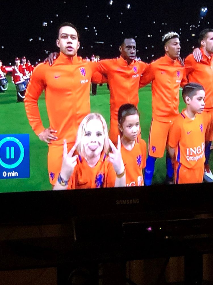 That Dutch mascot kid sticking his fingers up at the tv camera 