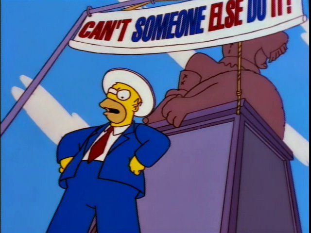 Homer Simpson in front of a campaign banner reading "Can't someone else do it?"