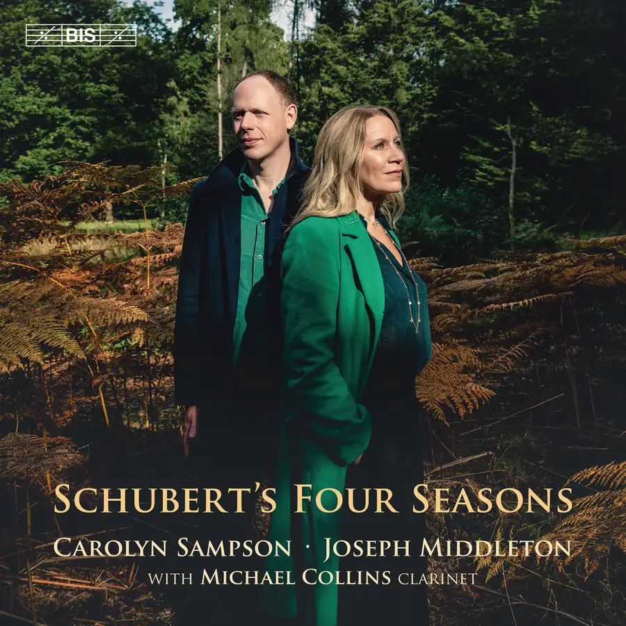 The CD cover featuring the duo wearing green, to tone with the woodland setting.