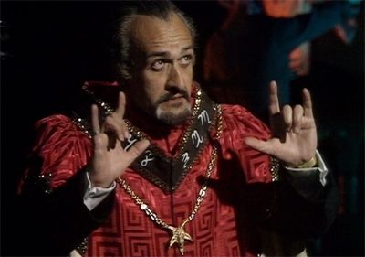 Roger Delgado as The Master hopes to control Azal with the sign of horns