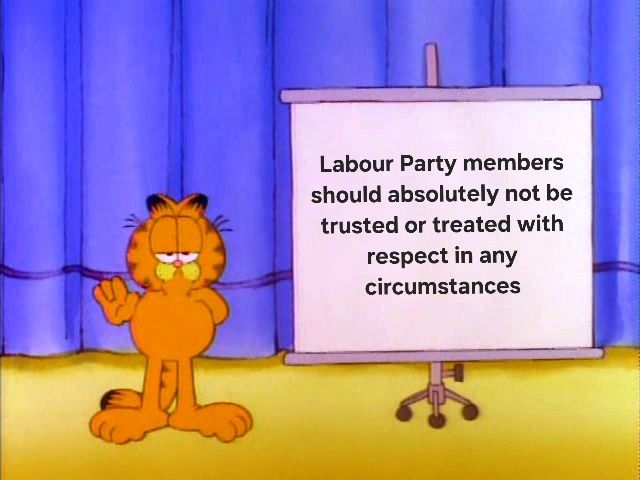 Garfield the cartoon cat, standing in front of a presentation board. It has a message on it, reading "Labour Party members should absolutely not be trusted or treated with respectin any circumstances".