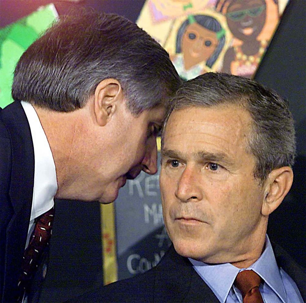 "Another plane has hit the towers" is whispered to George W Bush on 9/11.