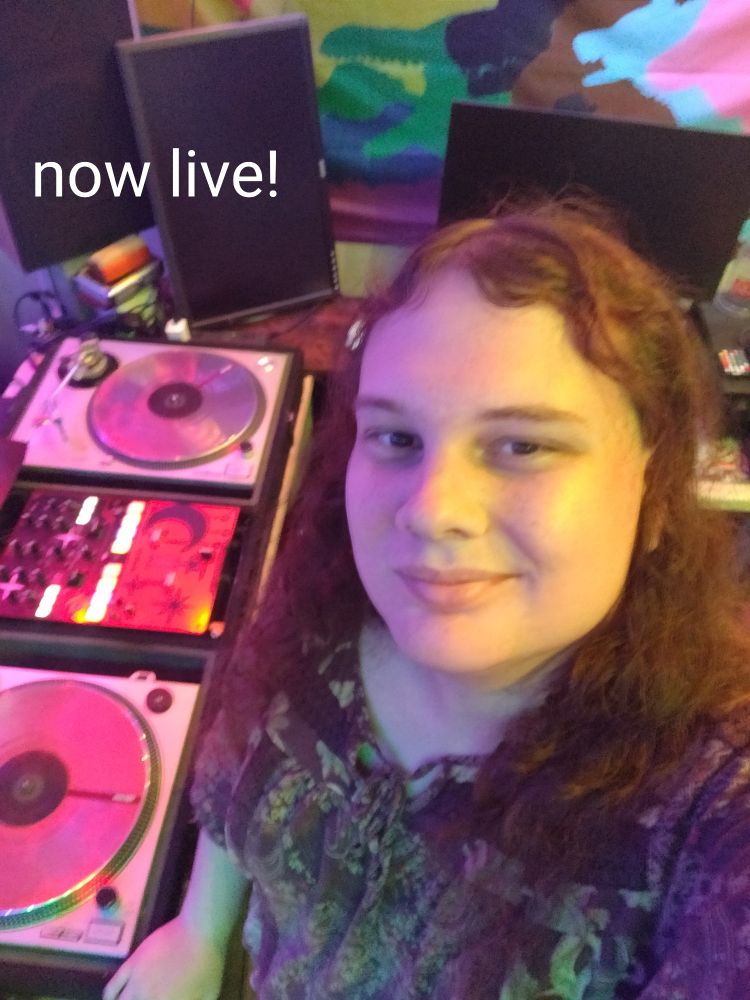 Sierra in the dj studio with text saying "now live" above her.