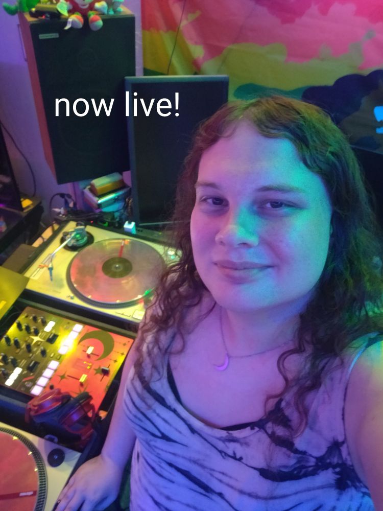Sierra in the dj studio with a caption saying "now live!"