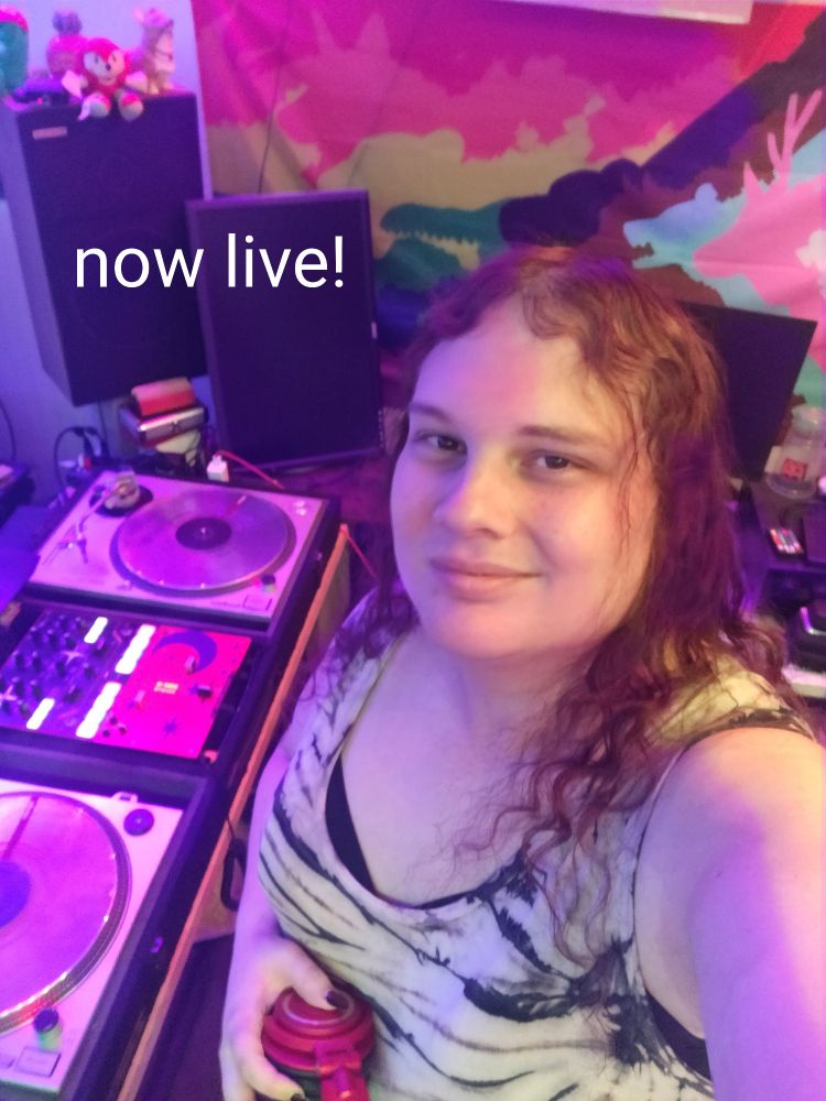 Sierra in her dj studio, with a caption saying "now live!"