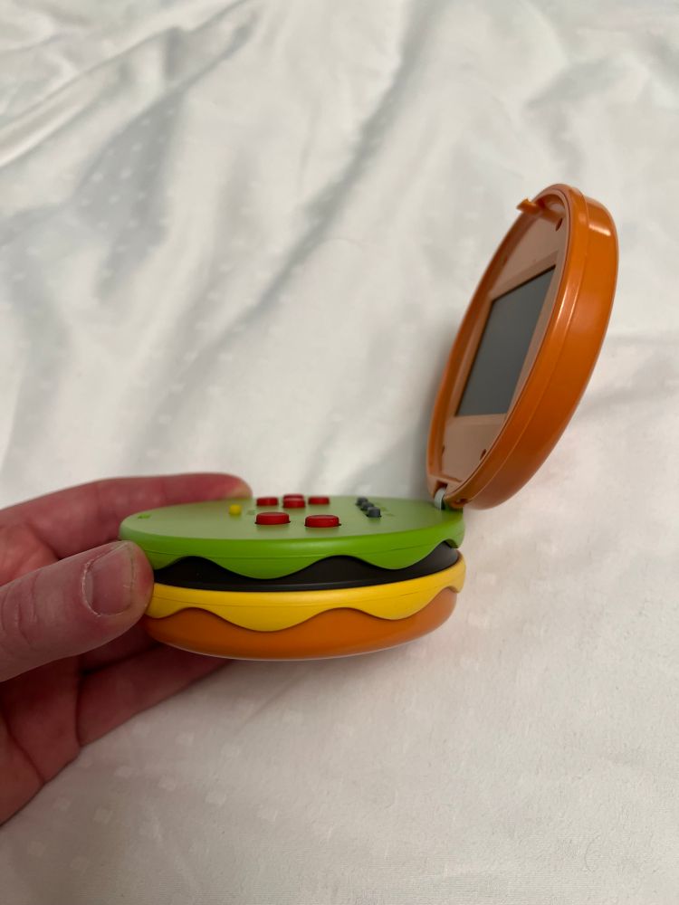 It’s a cheeseburger-shaped game console. Not a switch prototype. Cheeseburger.