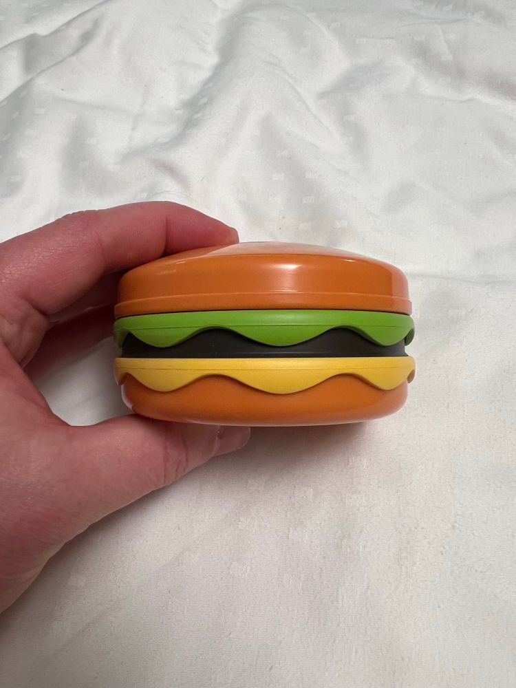 It’s a cheeseburger-shaped game console. Not a switch prototype. Cheeseburger.