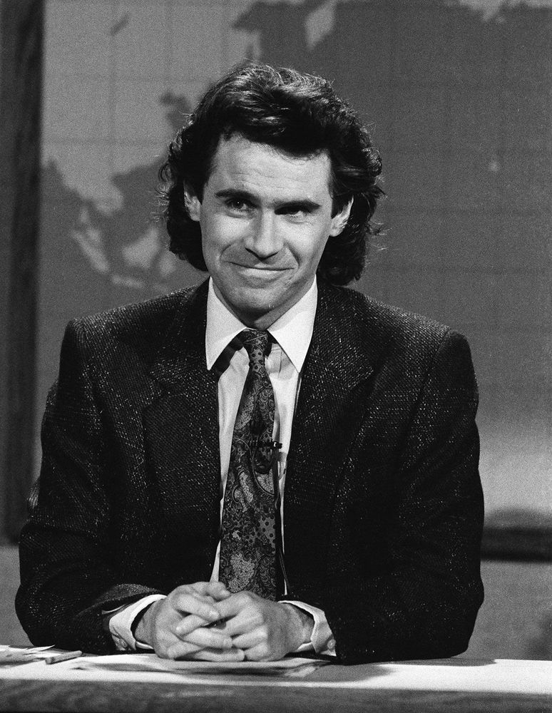 Dennis Miller at the SNL Weekend Update desk.