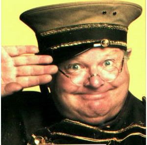 Fred Scuttle saluting.
