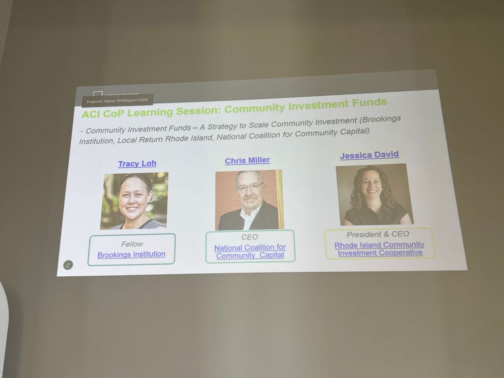 A photo of a slide showing theee panelists:
Tracy Loh, fellow, Brookings Institution
Chris Miller, ceo, National Coalition for Community Capital 
Jessica David, President and ceo, Rhode Island Community Investment Cooperative 