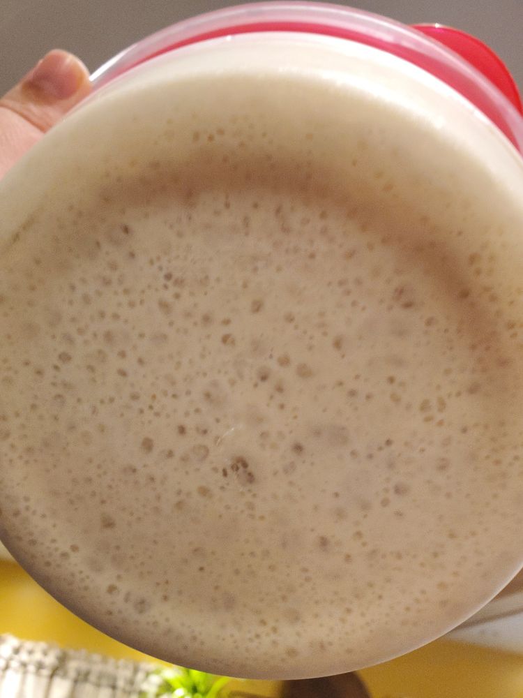 Bottom of bowl of pre-ferment, a mix of flour water yeast and honey. 