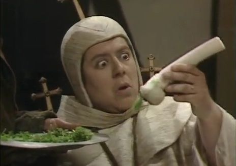 Miriam Margolyes as Lady Whiteadder, holding the turnip shaped like a “thingy”
