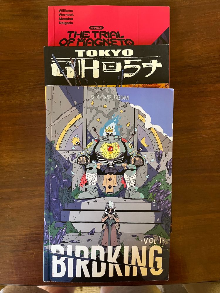 3 graphic novels. Birding Vol 1, Tokyo Ghost Vol. 1, and The Trial of Magneto