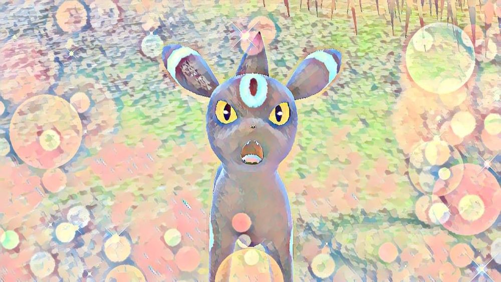 Shiny Umbreon makes an attacking pose for a photo. Pastel colors are used in the photo.