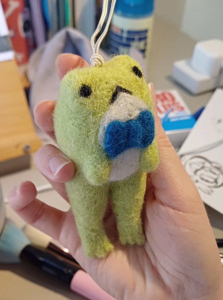Felt froggo with bow tie.
