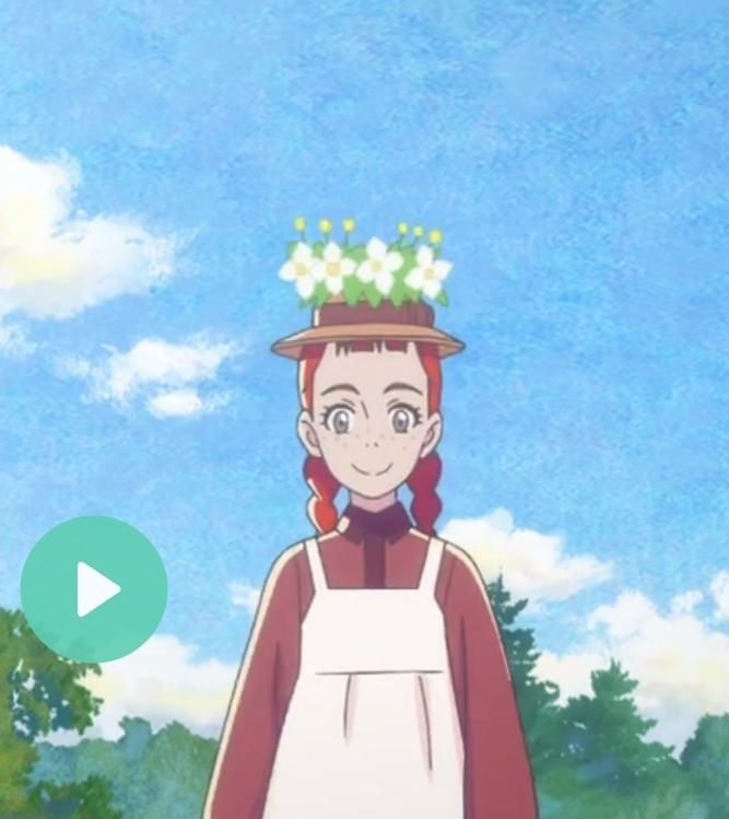 Anne Shirley con una cara alegre y un gorro con flores