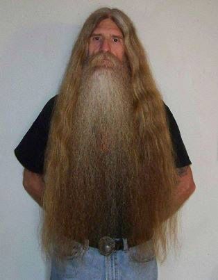 My friend Rev. Tramp. Yes, the hair and beard are real. He's been growing both since he got back from Nam. They're past his waist when he unbraids them now.