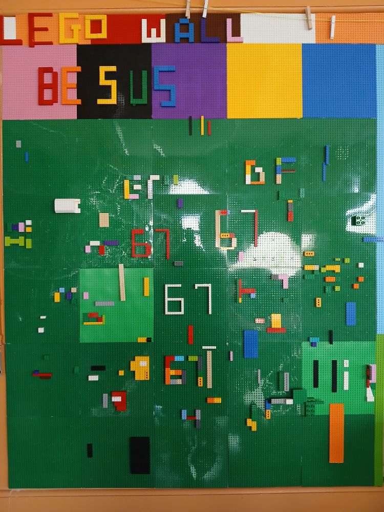 Lego Wall! I don't know why it's covered in the number 67. There's also a rainbow "BE SUS"