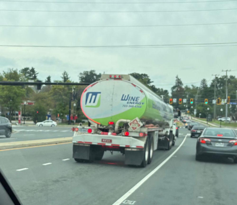 A truck with the words Wine Energy on the back. 
