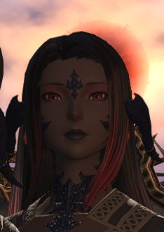 A close up of Taliya's face, looking down at the camera, with the red moon framed behind her.